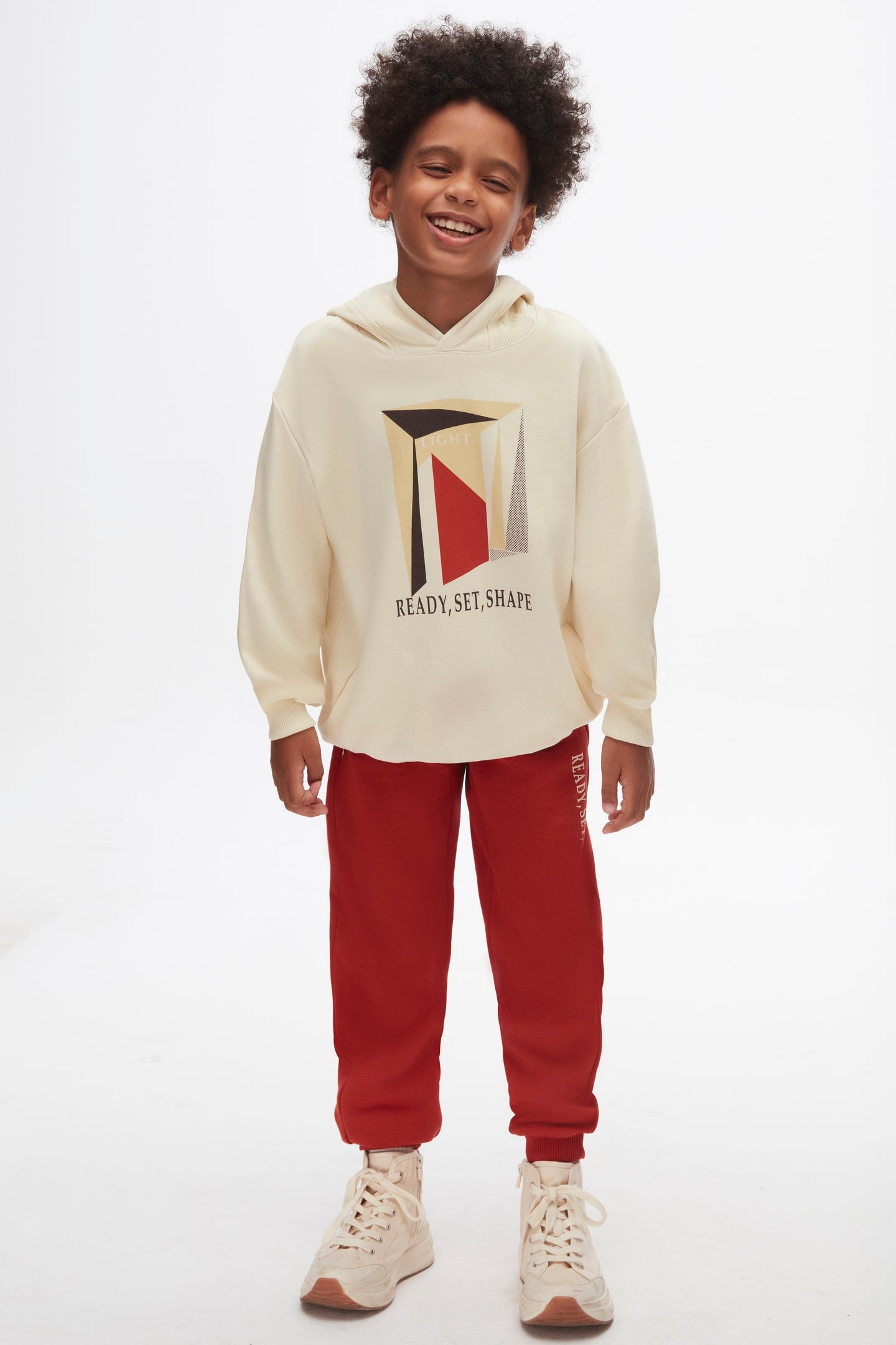 Boys Sweatshirt.The modern geometric design and neutral beige colour