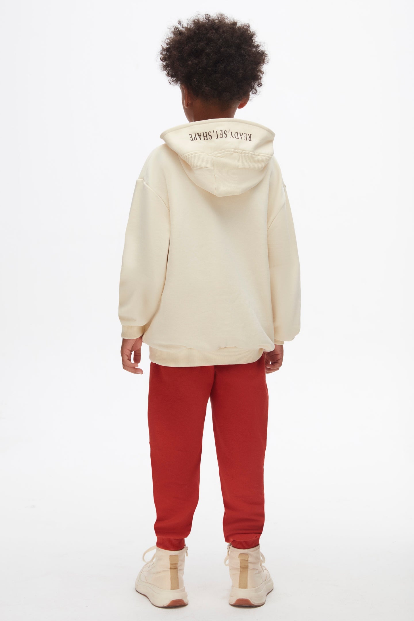 Boys Sweatshirt.The modern geometric design and neutral beige colour